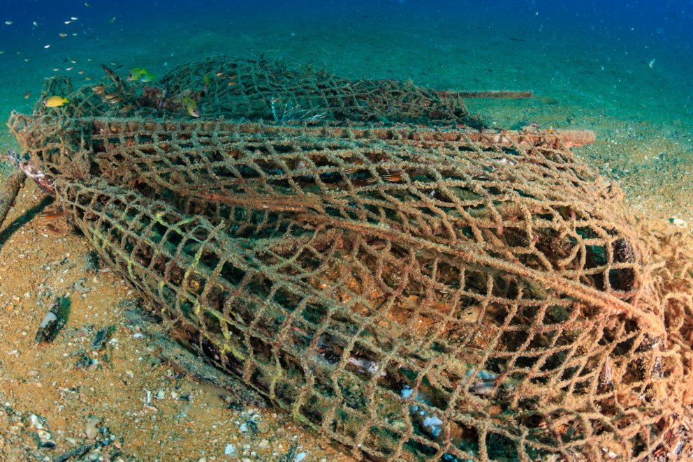 Abandoned ghost fishing nets on the sea floor/Shutterstock